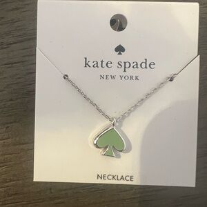 Kate Spade Silver Necklace with Green Spade Pendant